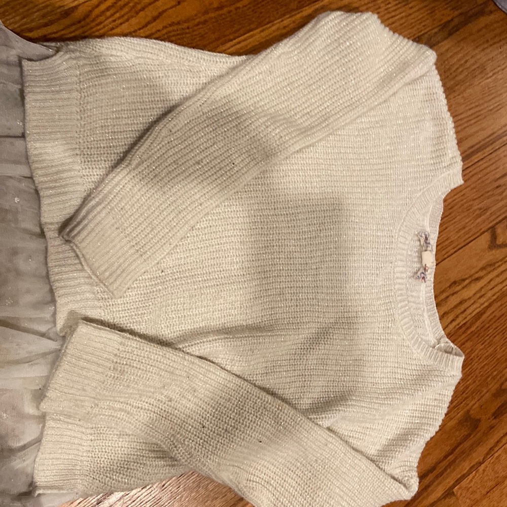 White glitter sweater with skirt at bottom